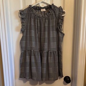 Chic Black and White Sleeveless Blouse